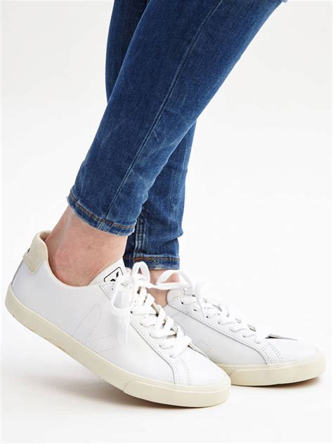 veja all white sneakers.